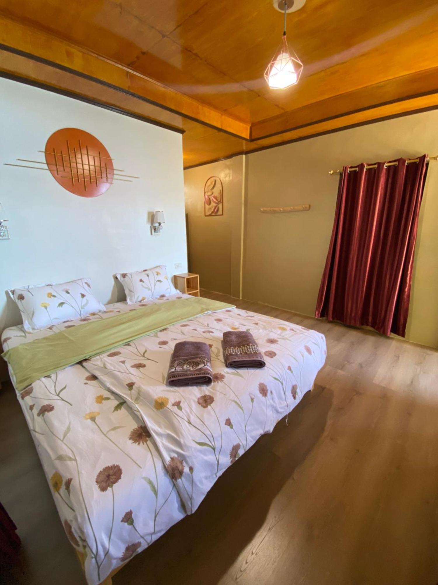 Romlan Hotel Tuktuk Værelse billede